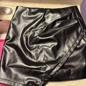 Black and pink leather skirt from Schein